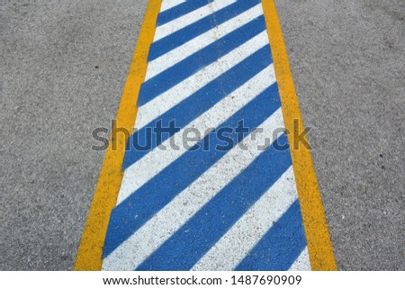 Disabled symbol signs yellow stripes boards