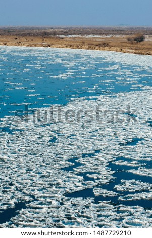 first frost formation of ice on the river. Ili Kazakhstan. Kapchagai Bakanas