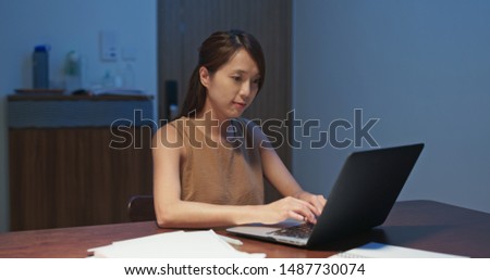 Woman work on laptop computer at home