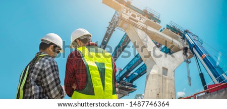 Civil engineer project expressway construction work. Engineer foreman discussion work control to highway construction working in site. Royalty-Free Stock Photo #1487746364