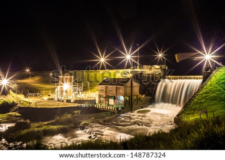 Night Scene of a small hydroelectric plant in rural Brazil - CÃ?Â¢ndido Mota, SP - Pari-Veado river Royalty-Free Stock Photo #148787324