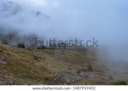 Mountains peaks clouds hiking tourism