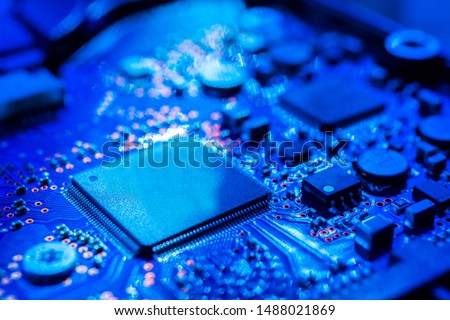 Circuit board.Motherboard digital chip. Electronic computer hardware technology.Integrated communication processor.Information engineering component.Tech science background. shallow focus effect. Royalty-Free Stock Photo #1488021869