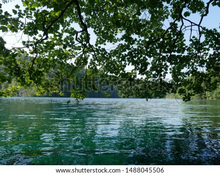 Amazing waterfall in Plitvice lakes national park in Croatia.  Colorful spring panorama of green forest with blue lake. Great countryside view of Croatia, Europe.