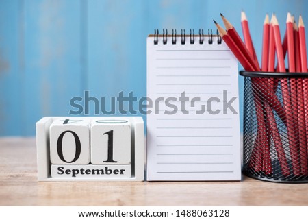 Hello September Calendar, Welcome Back to school concept with notebook and pencils. copy space for text