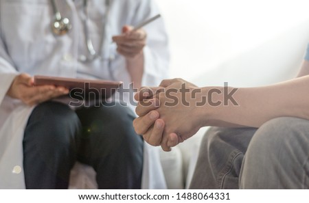 Mental health neuropsychology concept. Professional psychologist doctor  consult therapy in psychotherapy session or counsel diagnosis health with a man patient. Royalty-Free Stock Photo #1488064331