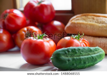 Mediterranean food composition: with tomato, cucumber and bread. Spain.