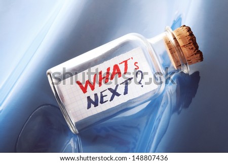 An artistic concept of a vintage bottle with a message "what's next?" 
