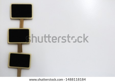 Small blackboard  On a white background  For adding additional text  Business presentation