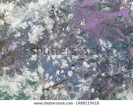 Background of white, blue and purple splashes of paint. Fragment of artwork. Texture of backdrop