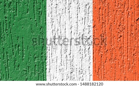 Flag of Ireland close up painted on a cracked wall