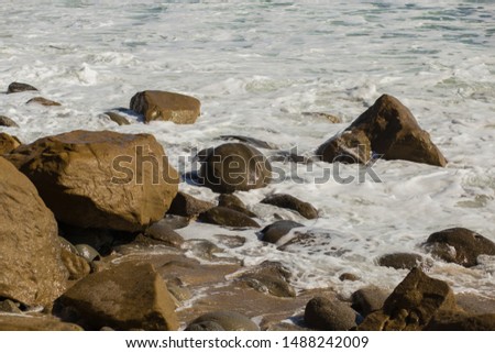 Stones with strange signs on the coastline of the Black Sea. Traces of the dead of unknown civilizations. Geological mysterious formations.