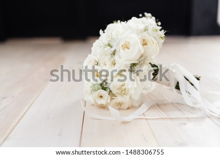 white bride's bouquet. bouquet with peonies and peony rose