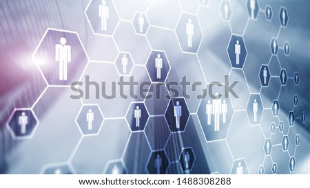 3d Digital composite image of people icons on office buildings background.