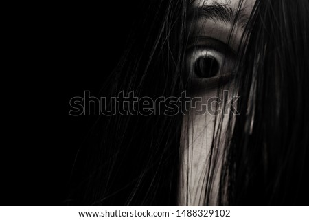 Close up of scary ghost woman eye 
