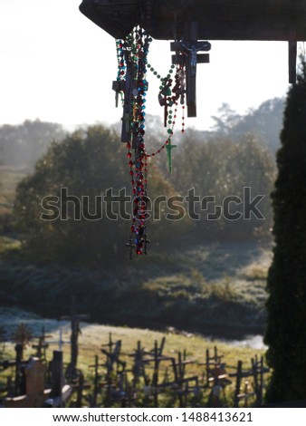 Field of crosses hanging in early morning.