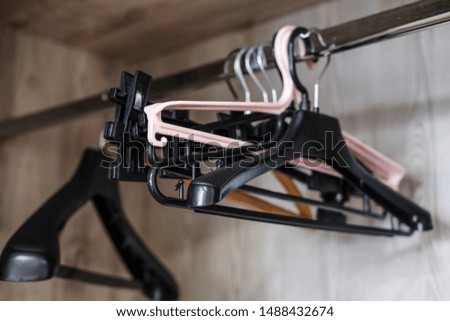 The image of a raw of hangers