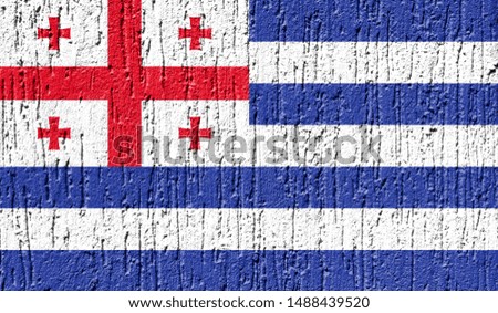 Flag of Adjara close up painted on a cracked wall