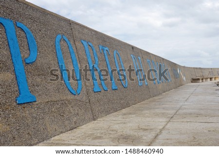                                Port of Tropea concrete wall sign