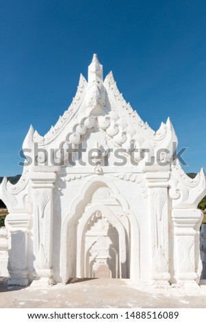 Vertical picture of beautiful entrance to Hsinbyume Pagoda, a buddhist temple, landmark of Myanmar