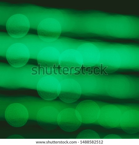 Green circles and lines abstract background.