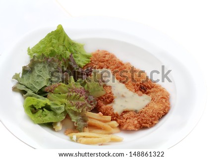 a photo of deep fried chicken steak with tomato fried and salad,isolated on white background
