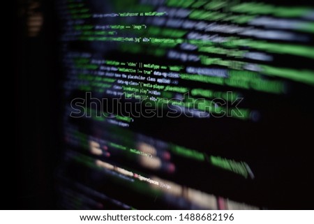 Website codes on computer monitor. Programmer workplace. Abstract screen of software. Computer program.