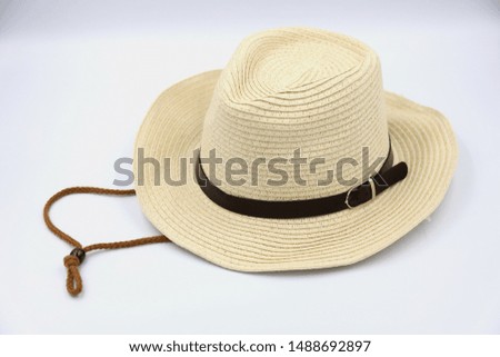 A straw hat isolated on white background good for traveling.