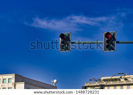 Traffic light against blue sky in la spezia