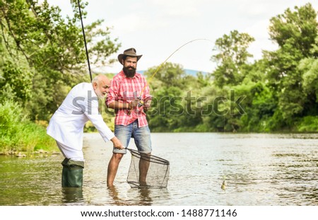 Selection of jobs. hobby of businessman. retirement fishery. happy fishermen. Good profit. friends men with fishing rod and net. Fly fishing adventures. retired dad and mature bearded son.