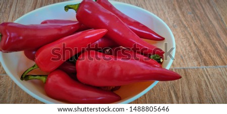 Stock photos, pictures and royalty-free images of Bowl with fresh organic red chilis ready to eat