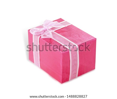Gift box pink color packing with ribbon pink color isolated on white background. This has clipping path.