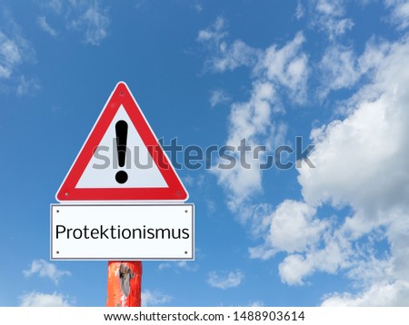 Warnsign protectionism on blue background in german