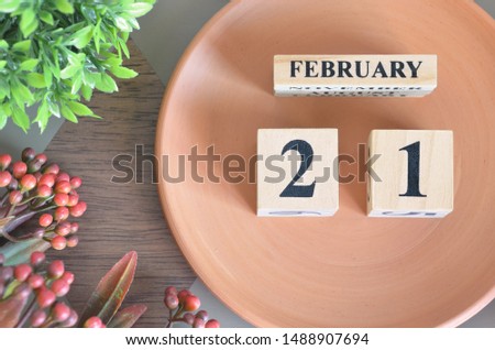 February month design with flower and earthenware, 21.