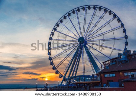 The ferris wheel on the waterfront of Seattle, Washington in late afternoon light