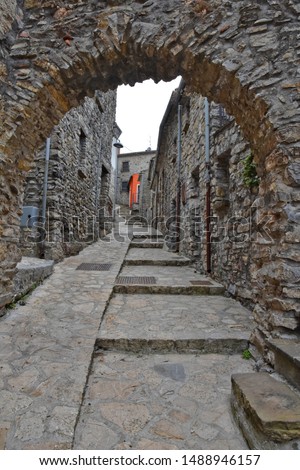 Stone arch of a mountain village, in the Italian region of Basilicata.