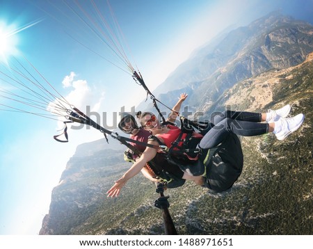 Flying on a paraglider. View of the coast from a height. Royalty-Free Stock Photo #1488971651