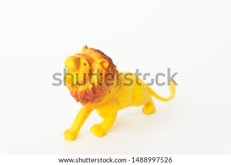 lion plastic toy for kids isolated on white background
