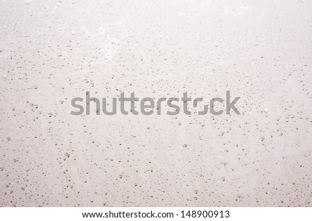 Background stained with mud  on the side of a car.