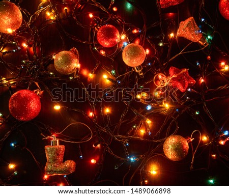 Horizontal bright Christmas garlands and Christmas decorations. Background bright rich color composition design concept.