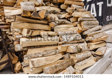 a huge pile of pine wood for ignition