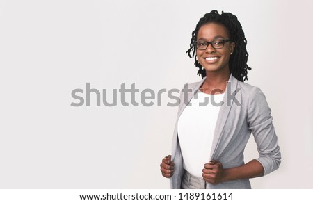 Successful Entrepreneurship. Happy Afro Business Girl Smiling At Camera Over White Background. Isolated, Empty Space For Text