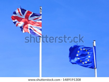 Flags of the United Kingdom and the European Union flying side by side