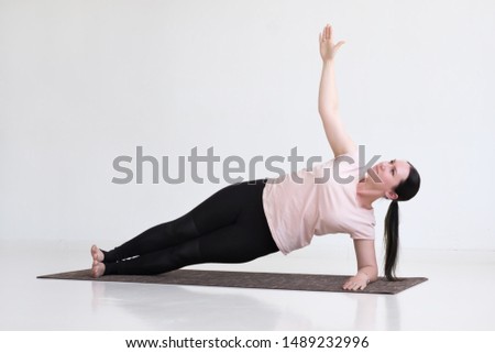 Caucasian woman doing exercises, Side Plank Pose, Vasisthasana, Yoga Pose, isolated on white background