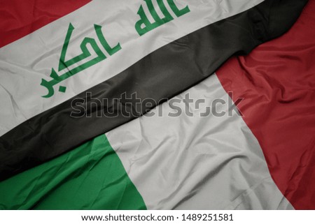 waving colorful flag of italy and national flag of iraq. macro