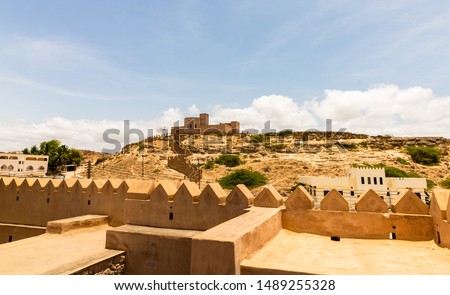 Old castle on the hill in Salalah, Sultanate of Oman. Royalty-Free Stock Photo #1489255328