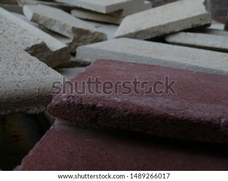 Bulk of colored bricks red and beige