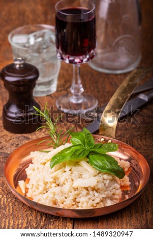 italian risotto with spices on wood