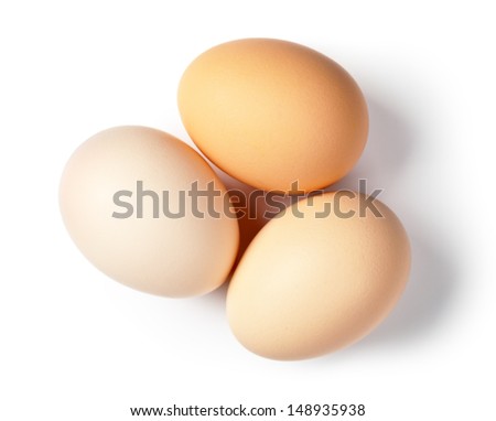 Three eggs on white background. Top view Royalty-Free Stock Photo #148935938