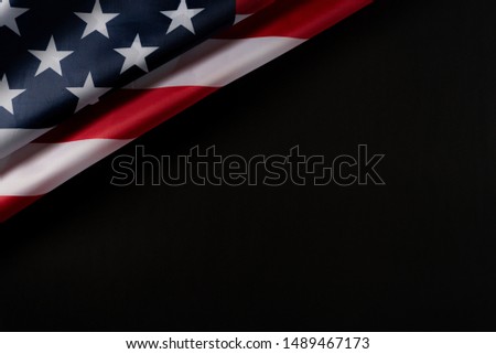 Top view of American flag on dark background. Happy Labor Day. Memorial Day.